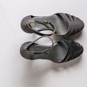 Ankle strap high heel sandals.